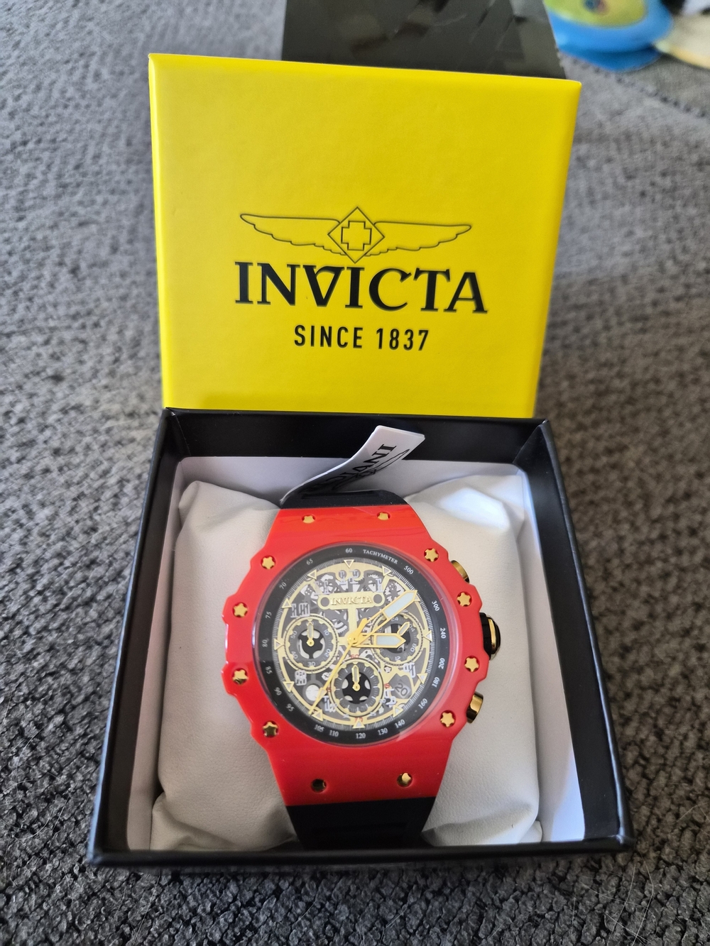 Invicta Red and Gold Skeleton Chronograph Watch with Black Strap